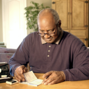 Getty image African American Older Man With Glucometer Kit